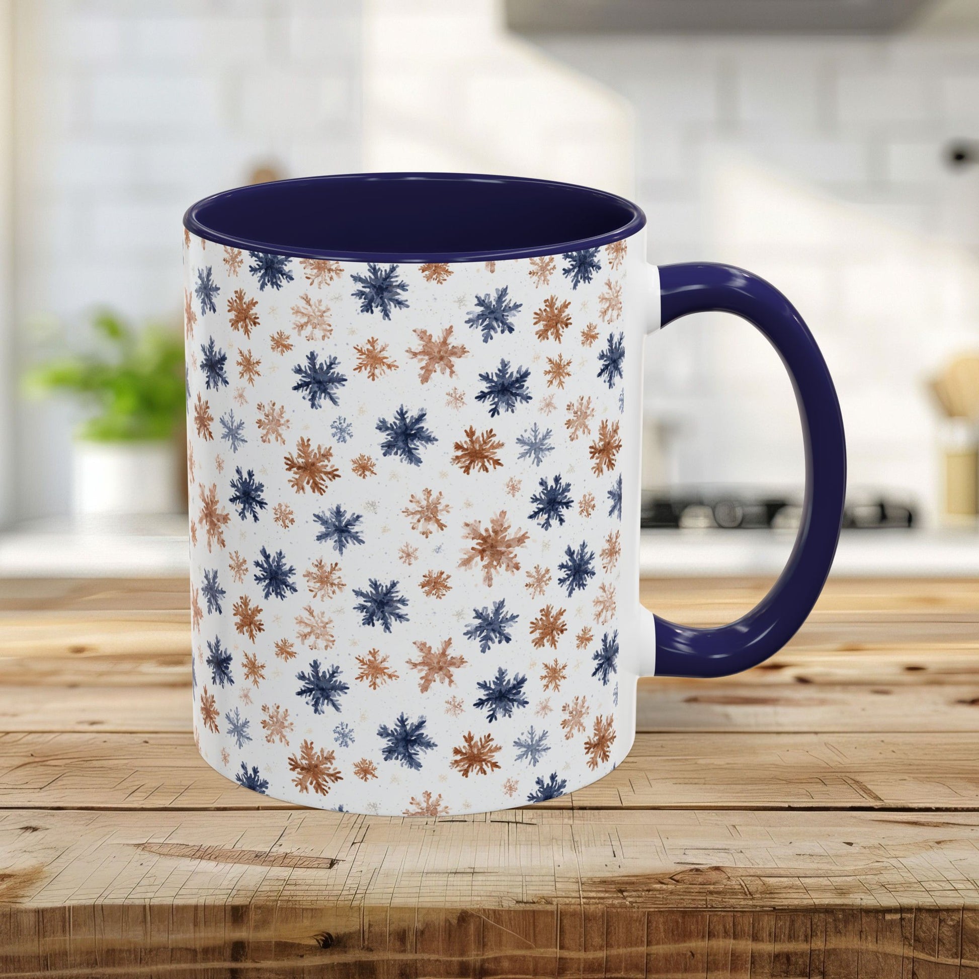 11oz white mug with navy interior and handle, featuring boho blue and taupe watercolor snowflakes.
