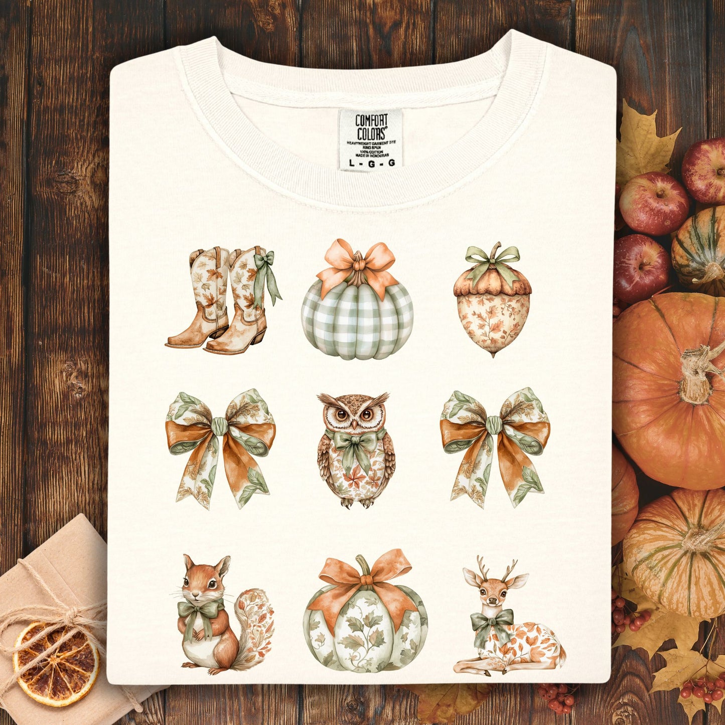Ivory cotton t-shirt with boho fall artwork: bows, pumpkins, acorn, owl, squirrel, and deer.