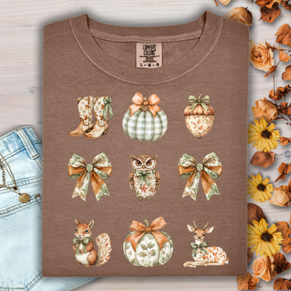 Espresso cotton t-shirt with boho fall artwork: cowboy boots, pumpkins, bows, an owl, a squirrel, and a deer.