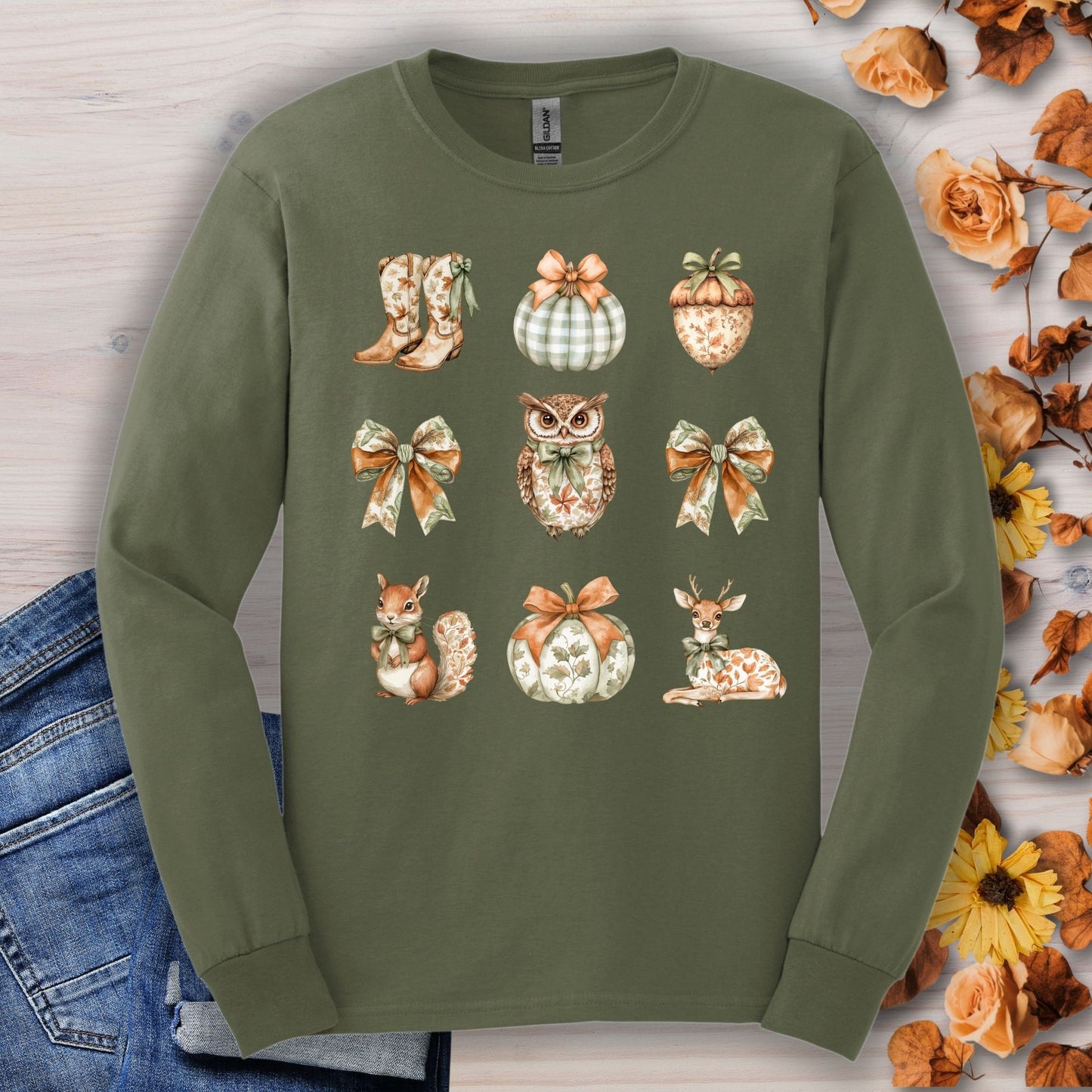 Military green long sleeve tee with cottagecore autumn owl, deer, squirrel, pumpkins, boots, and bows.
