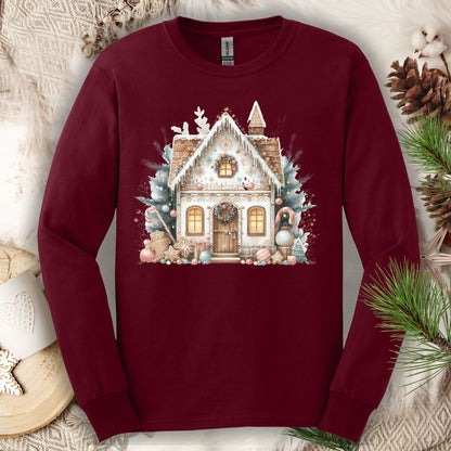 Maroon Gildan Softstyle long sleeve tee with a watercolor boho gingerbread house design.