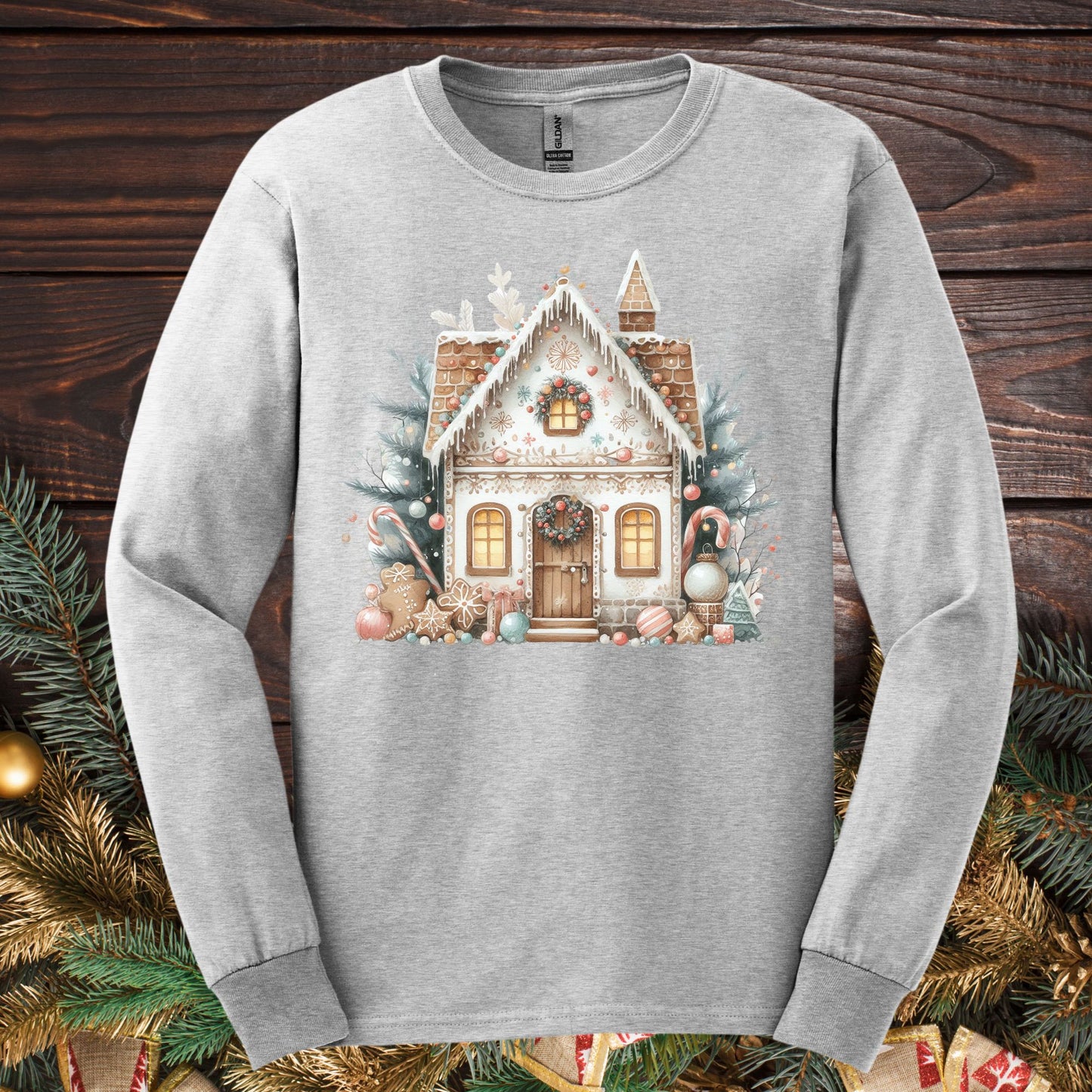 Ash gray Gildan long sleeve tee with a watercolor boho gingerbread house design.
