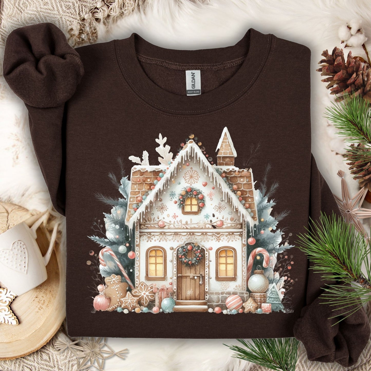 Dark Chocolate Gildan crewneck sweatshirt with a watercolor boho gingerbread house design.