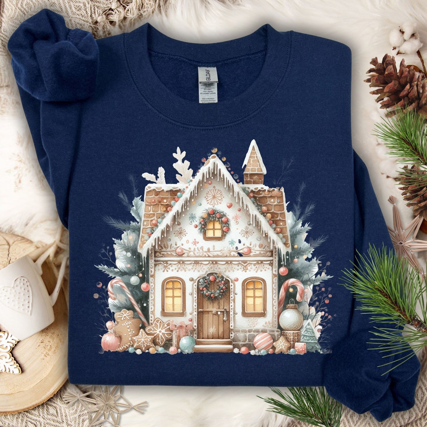 Navy Gildan crewneck sweatshirt with a watercolor boho gingerbread house design.