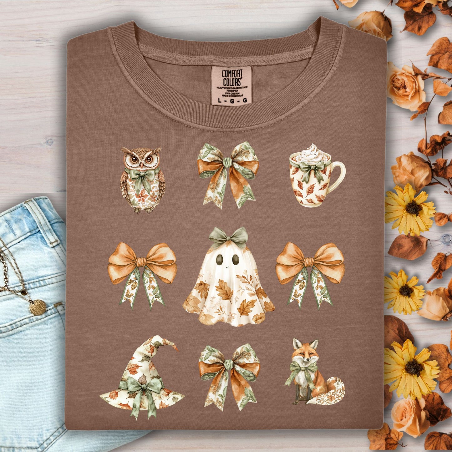 Espresso heavyweight cotton t-shirt with boho Halloween cottage art: owl, bows, ghost, latte, witch hat, fox.