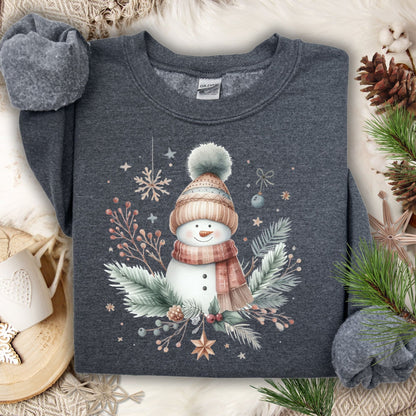 Dark Heather S crewneck sweatshirt with a boho watercolor snowman, evergreen sprigs, and ornaments.