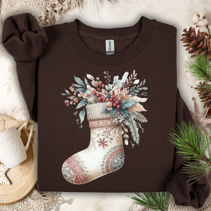 Dark Chocolate Gildan sweatshirt with a watercolor boho stocking design filled with greenery and berries.
