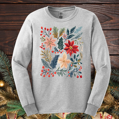 Ash gray long sleeve tee with a vibrant boho poinsettia floral design, rustic details, and red berries.