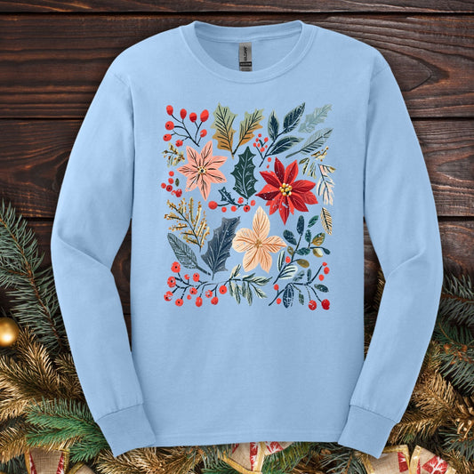 Light blue Gildan long sleeve tee with a vibrant boho poinsettia and floral design, perfect for festive wear.