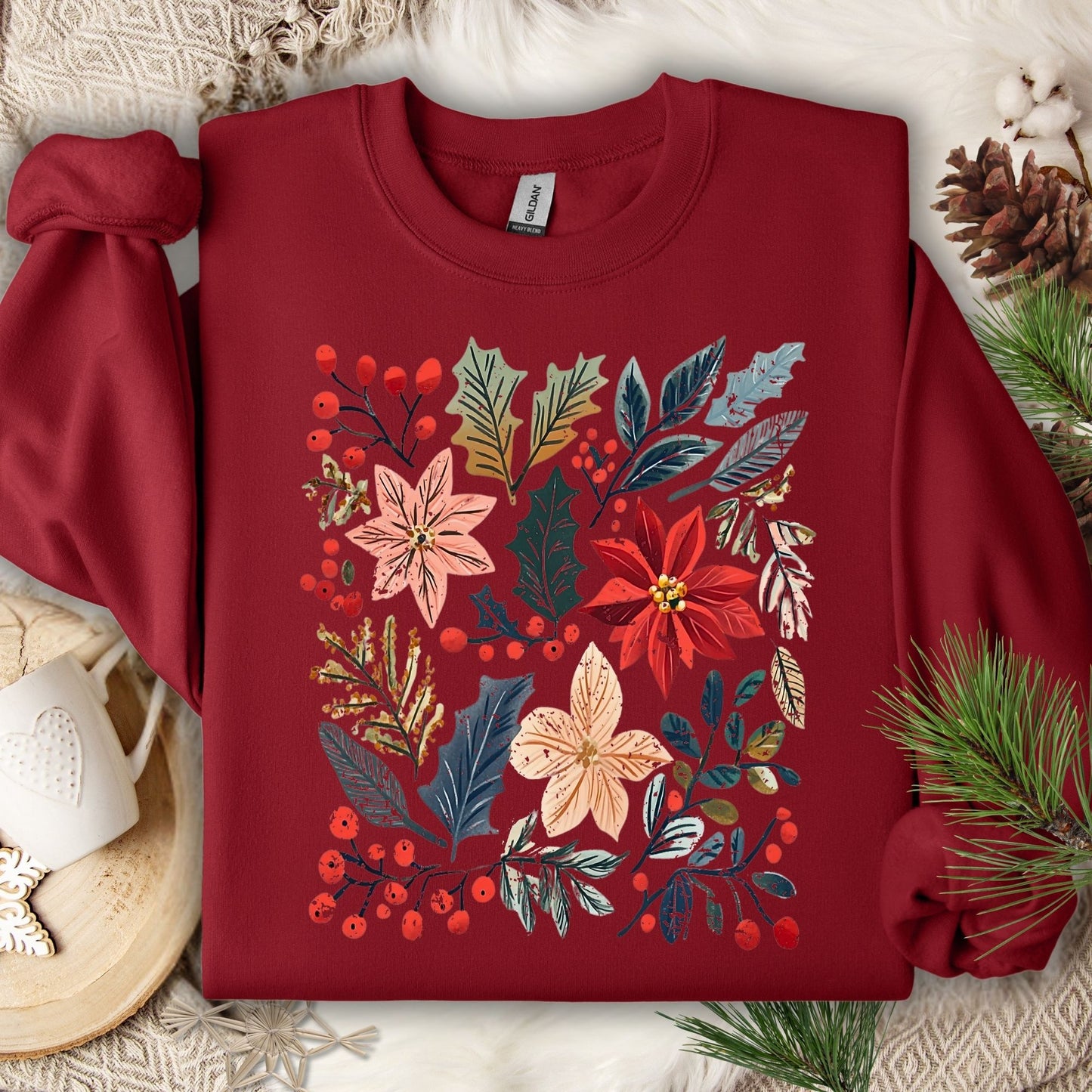 Cardinal Red Gildan sweatshirt with vibrant boho watercolor poinsettia and floral design.