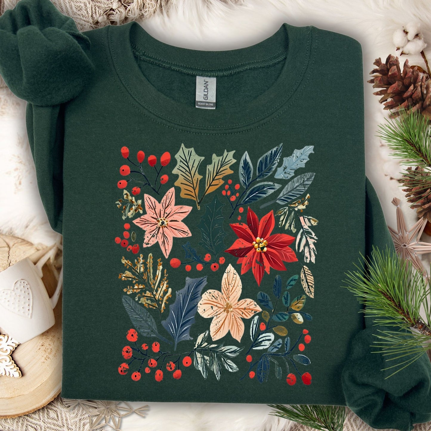 Forest green Gildan sweatshirt with vibrant boho watercolor poinsettias, berries, and leaves.