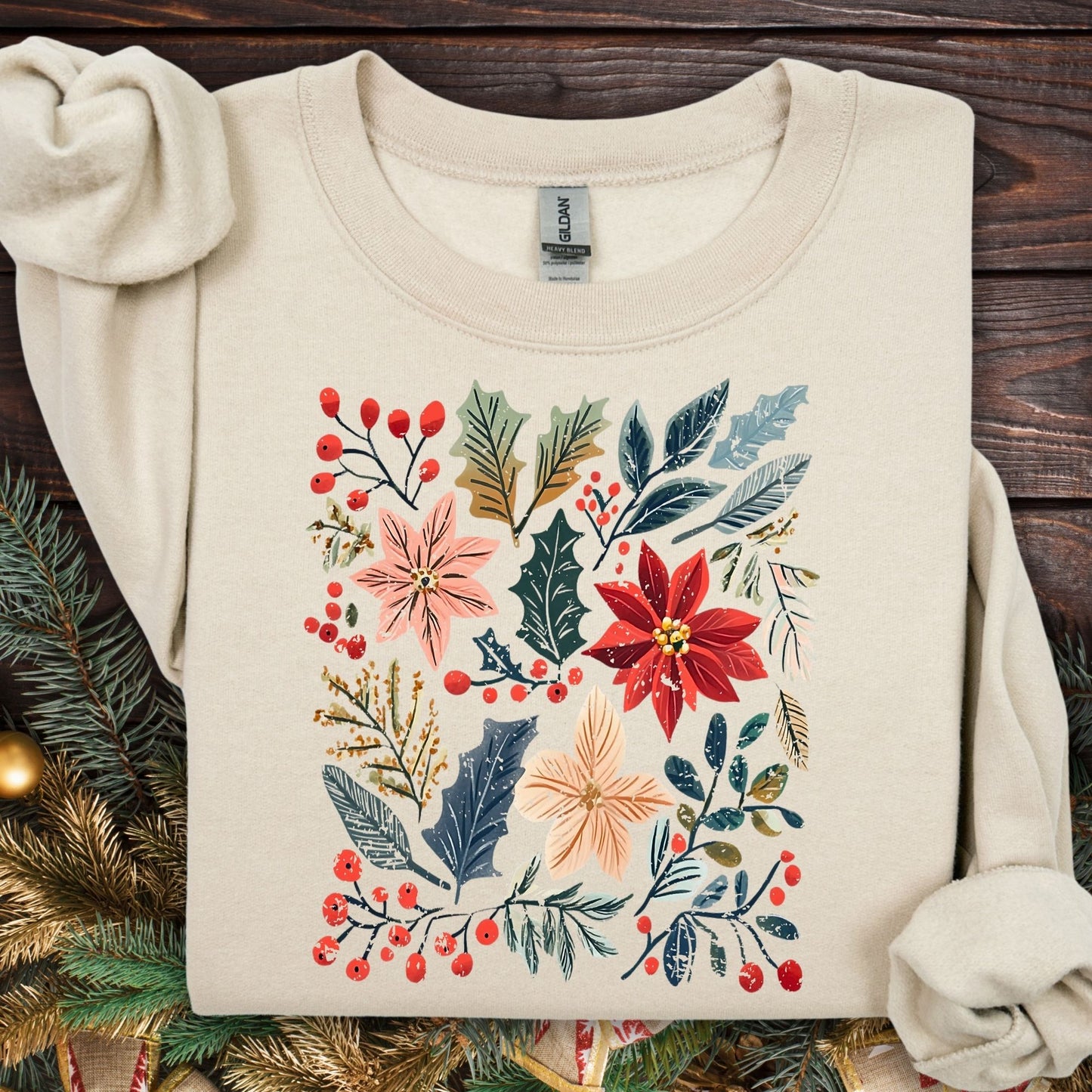 Sand Gildan sweatshirt with vibrant boho watercolor poinsettias, berries, and leaves.