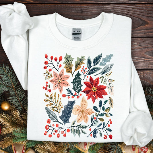 White Gildan sweatshirt with vibrant boho watercolor poinsettias, berries, and leaves.