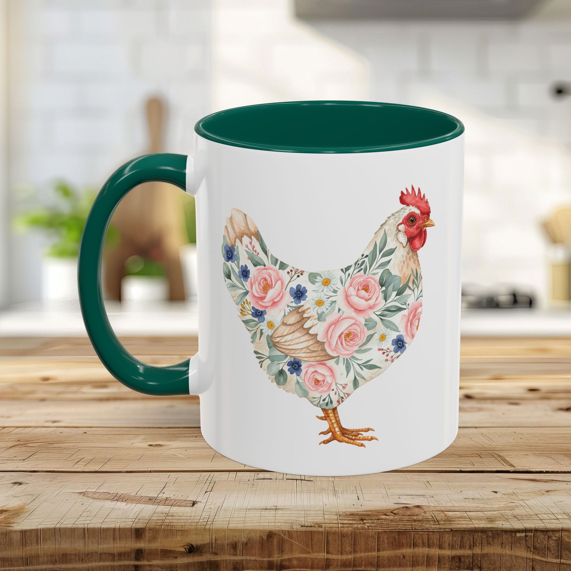 White ceramic mug with a watercolor floral chicken print, green interior, and C-handle on a wooden table.