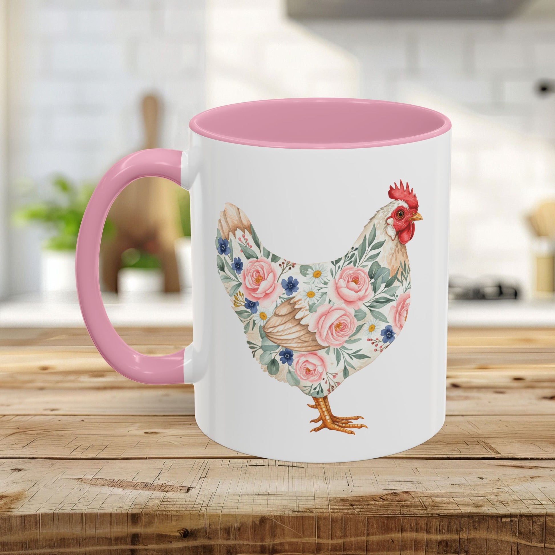 White ceramic mug with a pink handle and interior, featuring a watercolor floral chicken design.