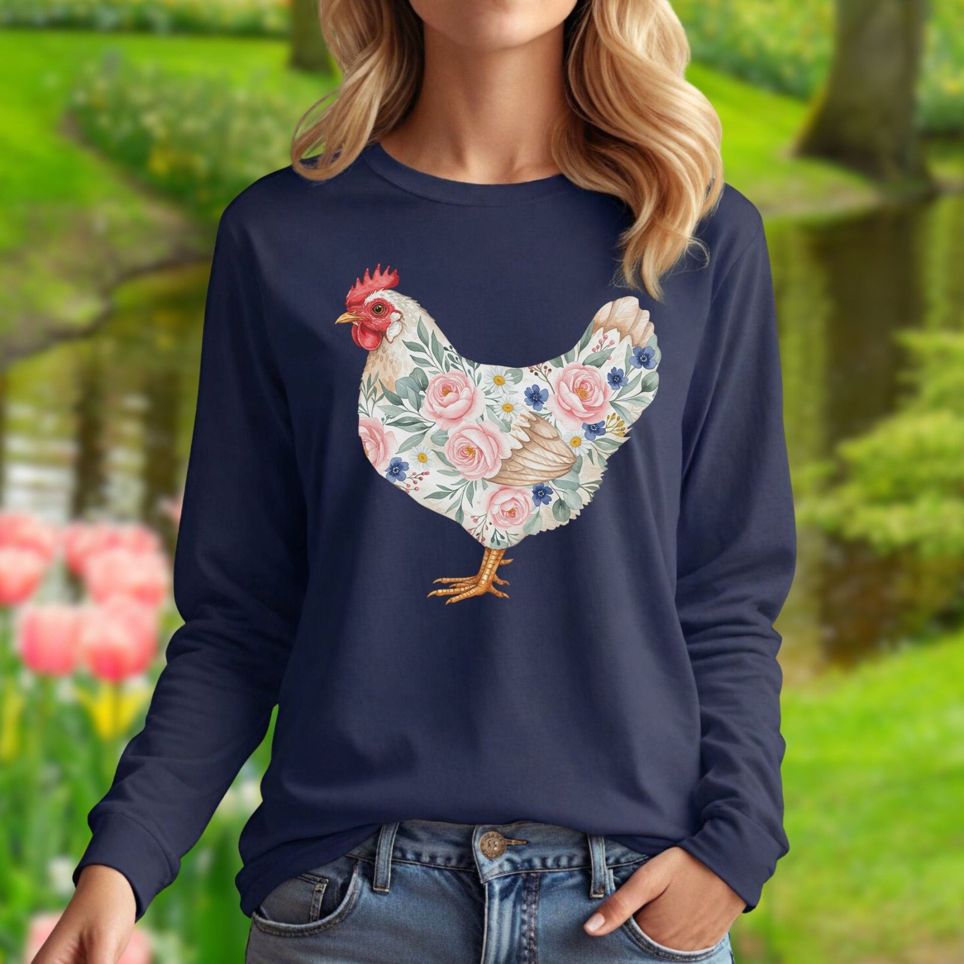 Navy long sleeve tee with a watercolor botanical hen design featuring pink roses and green leaves.