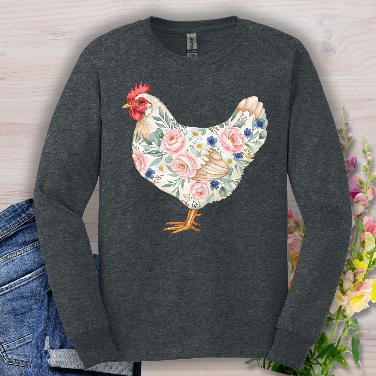 Dark Heather long sleeve tee with a watercolor hen adorned with pink and blue botanical details.