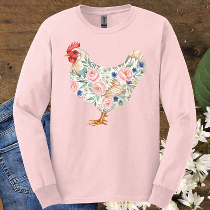 Light pink long sleeve tee with a watercolor botanical hen design, featuring pink and blue flowers.