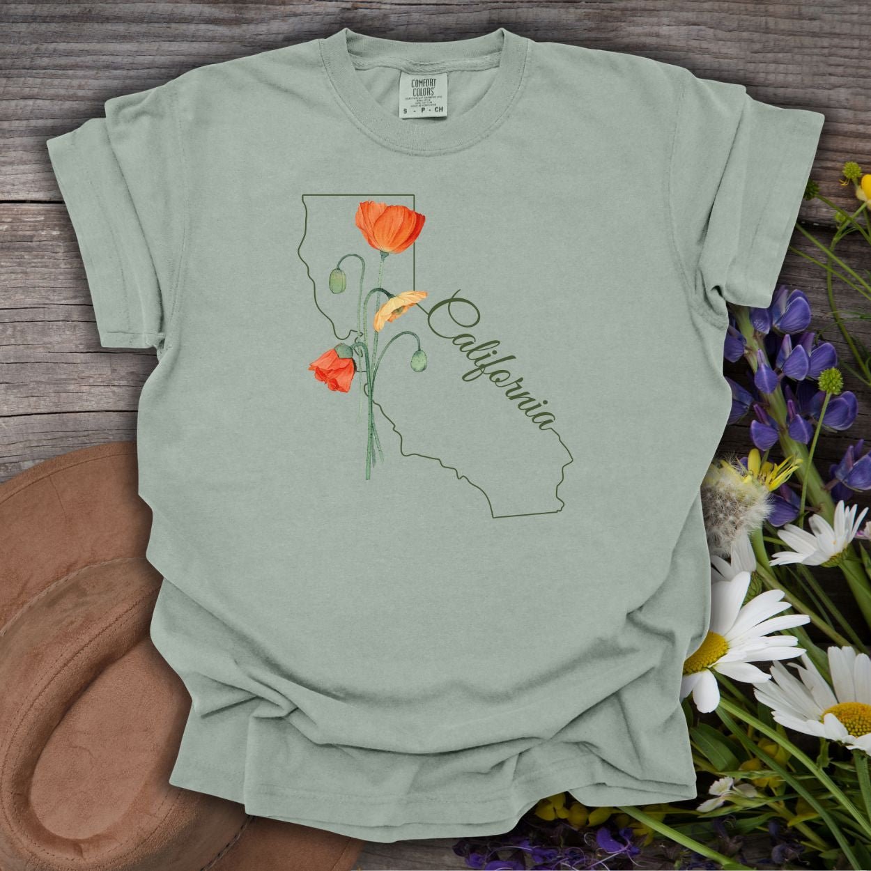 Relaxed-fit, garment-dyed Bay green t-shirt with California map, poppies, and script design.