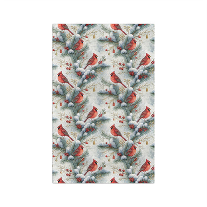 Microfiber tea towel with watercolor red cardinals, snowy pine branches, and holly berries.