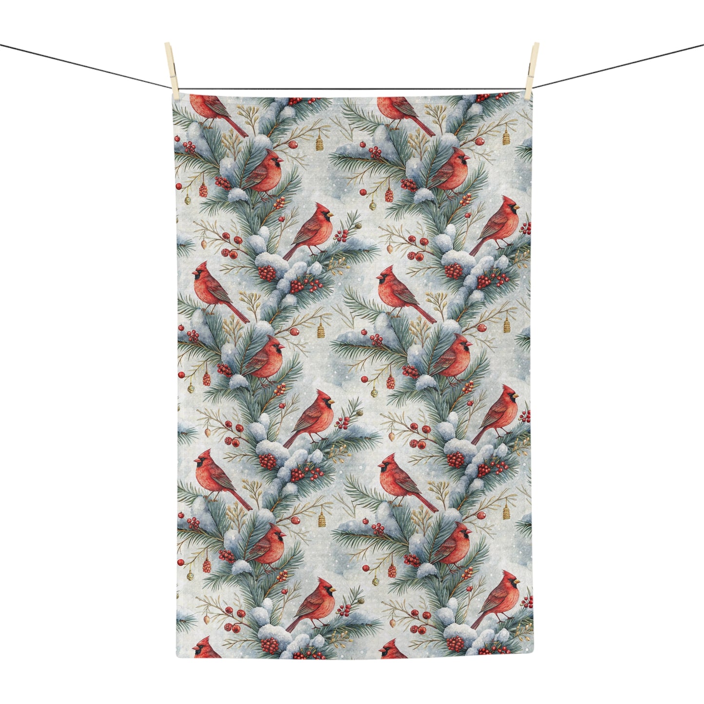 Microfiber tea towel with a repeating watercolor pattern of red cardinals on snowy pine branches and holly berries.