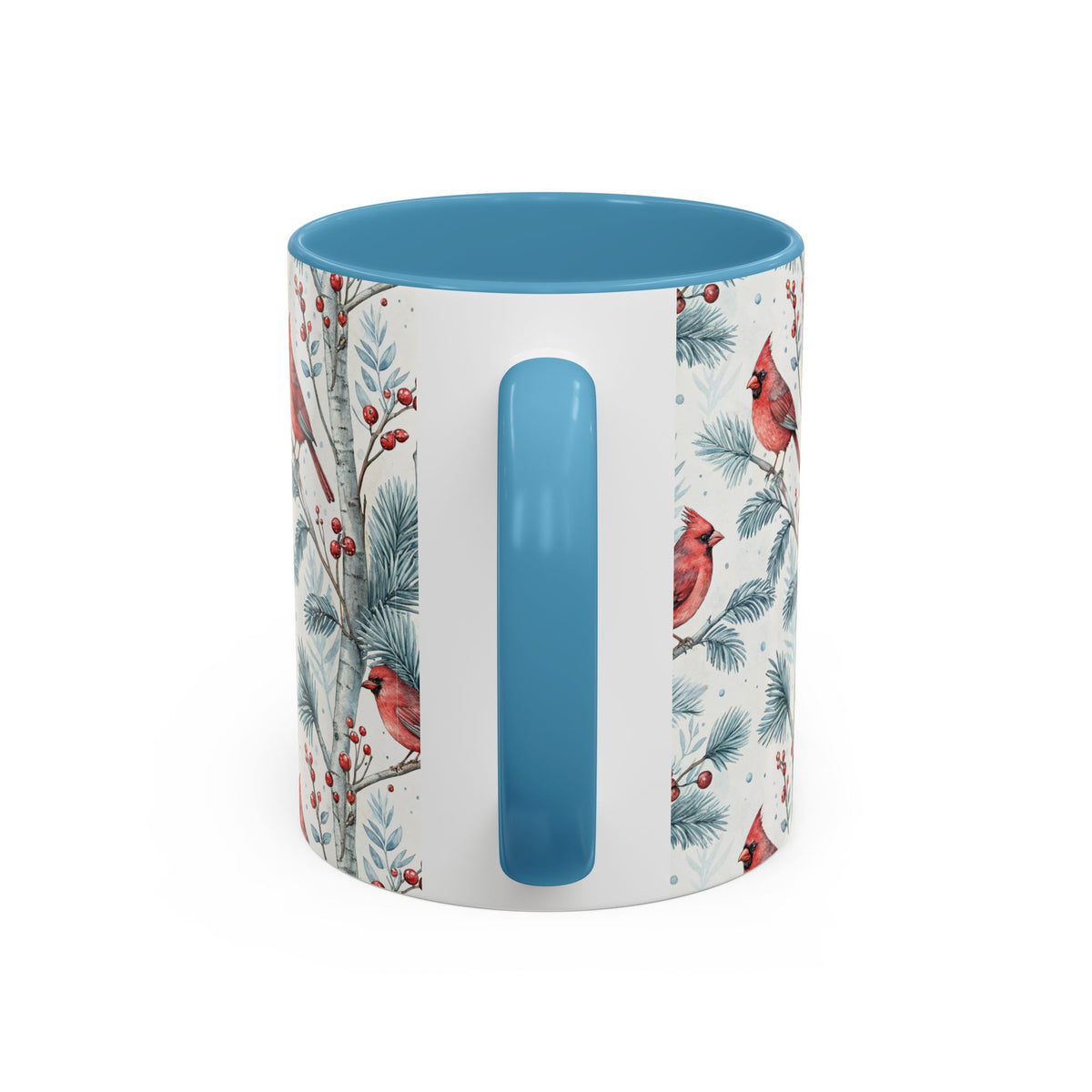 White ceramic mug with blue handle and interior, featuring watercolor cardinals in snowy birch trees.