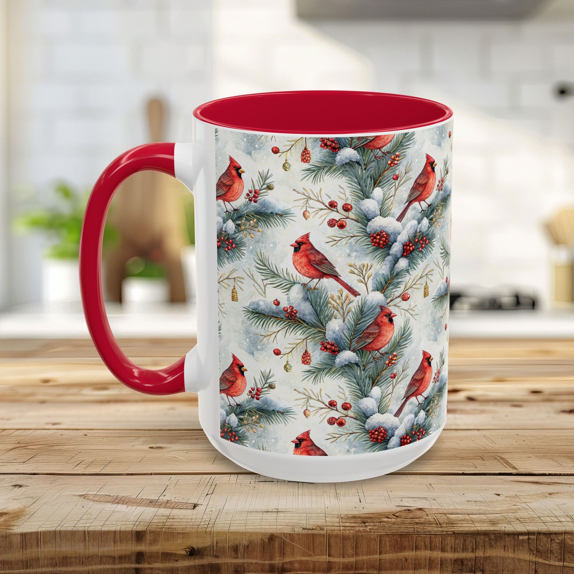 White ceramic mug with red interior and handle, featuring a watercolor cardinal and snowy evergreen design.
