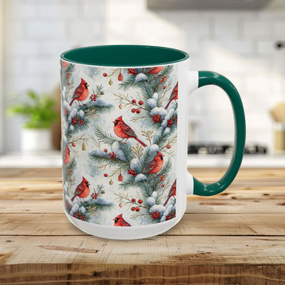 15oz ceramic mug with a watercolor cardinal and snowy evergreen design, green handle and interior.