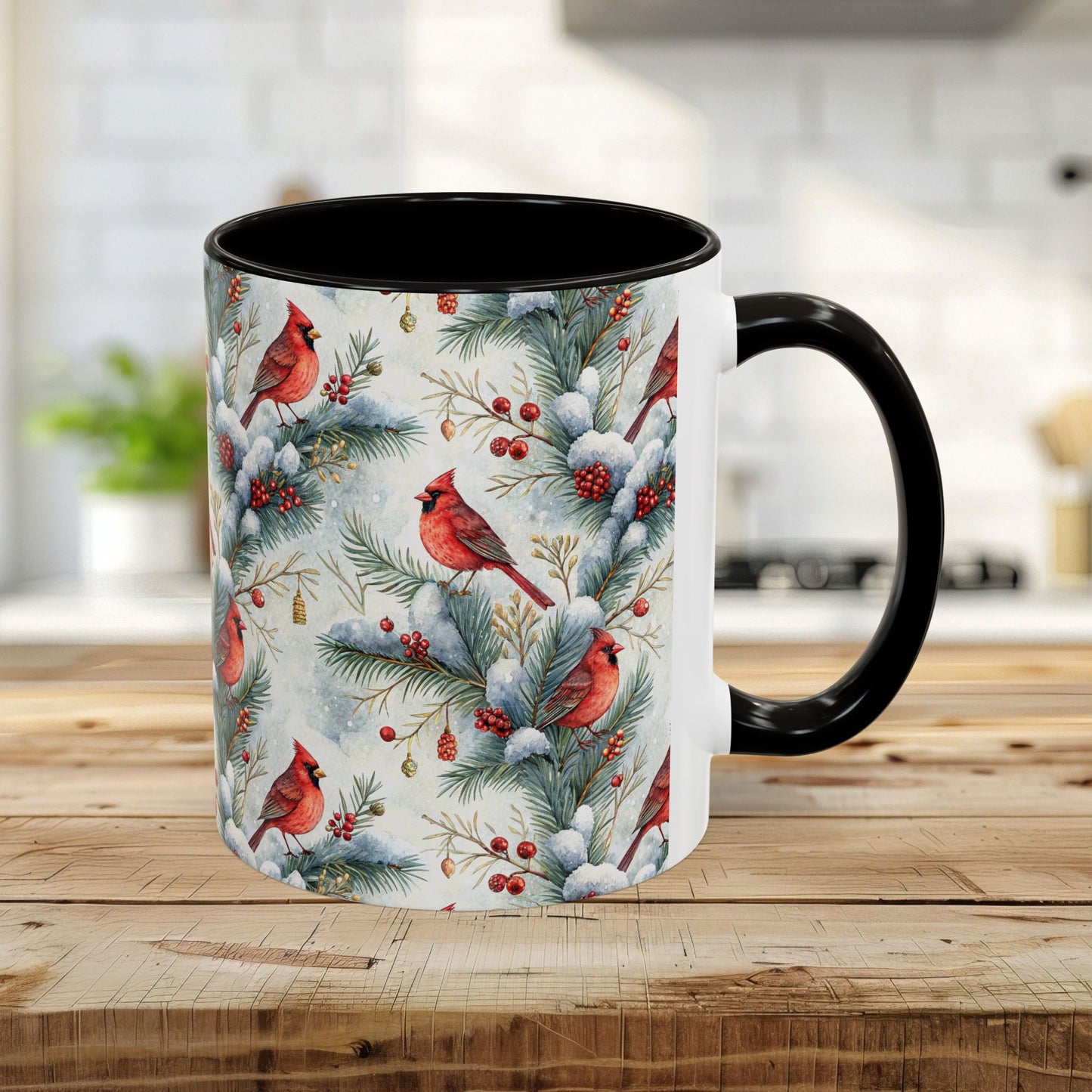 White ceramic mug with black interior/handle, featuring a watercolor cardinal and snowy evergreen design.