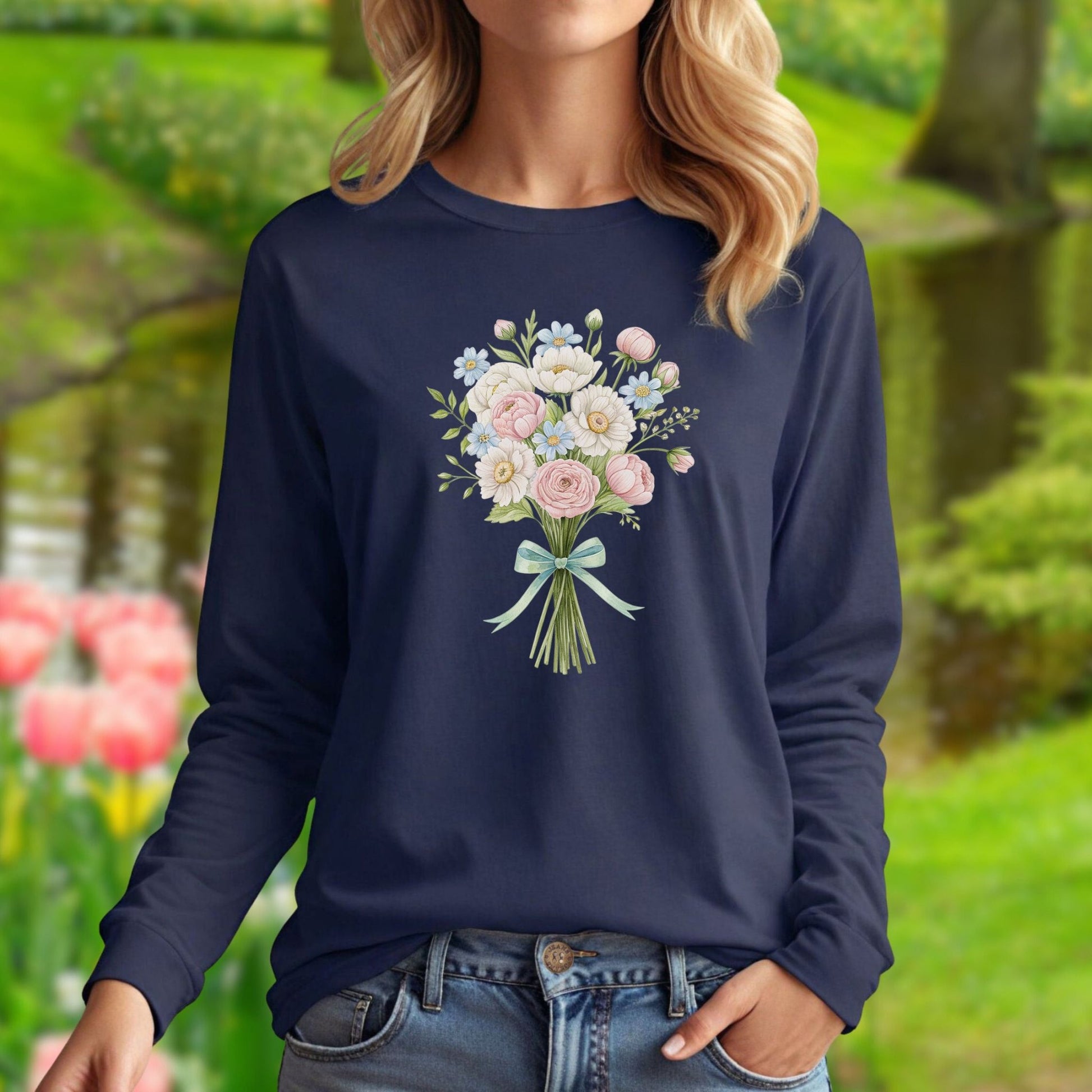 Navy long-sleeve tee with a cheerful botanical bouquet of dahlias, daisies, ranunculus, and roses.