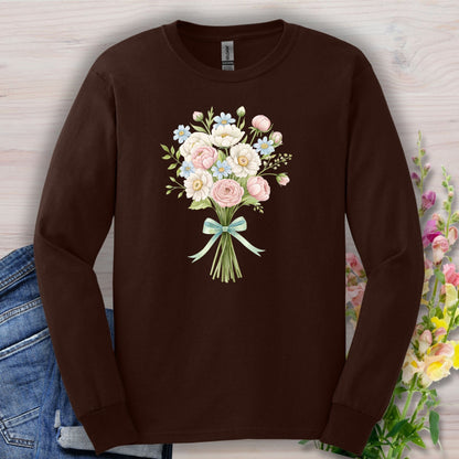 Dark Chocolate long sleeve tee with a botanical illustration of a tied bouquet of pink, white, and blue flowers.