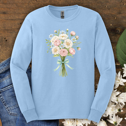 Light blue long-sleeve tee with a cheerful botanical illustration of a tied Easter bouquet.