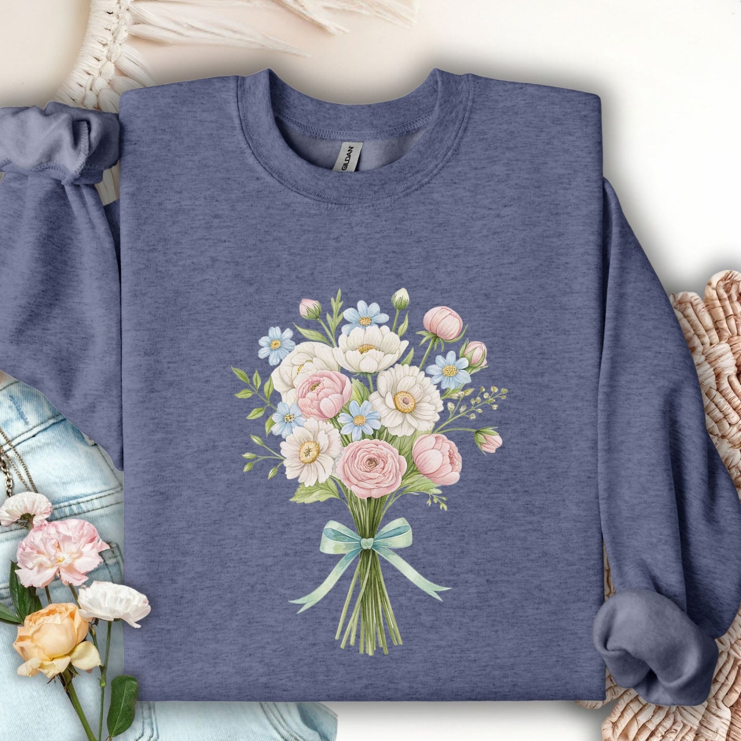 Heather Sport Dark Navy sweatshirt with a pastel floral bouquet of peonies, dahlias, ranunculus, and daisies tied with a mint ribbon.