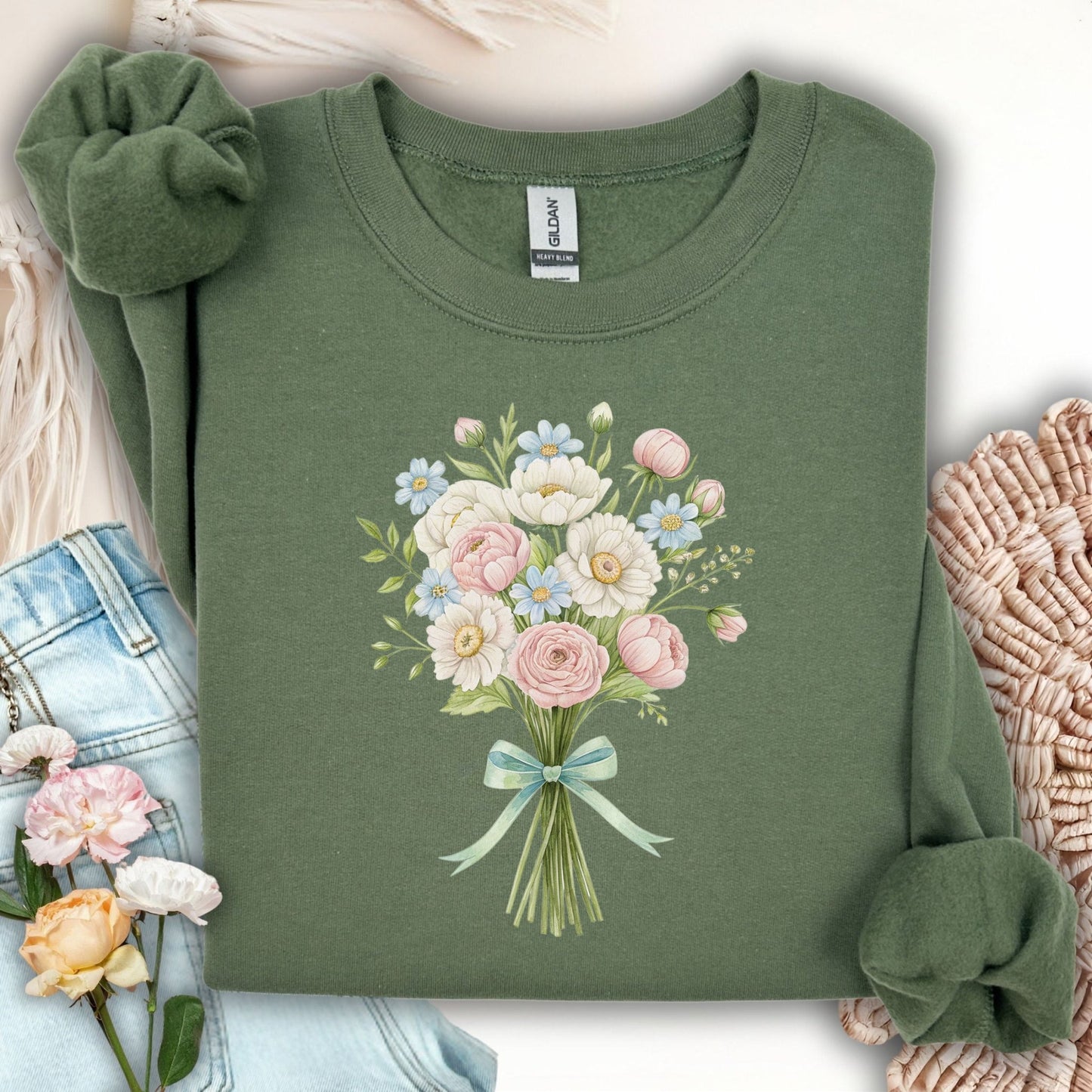 Military Green sweatshirt with a tied bouquet of pink, white, and blue flowers, green leaves, and a ribbon.