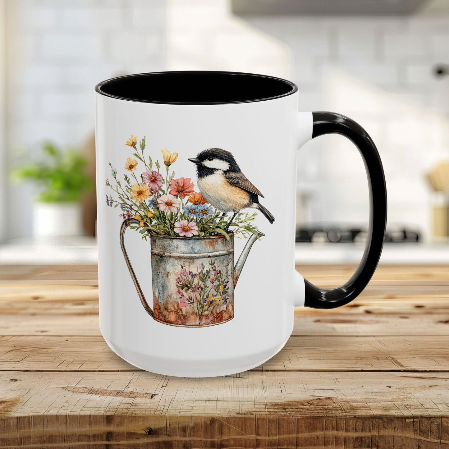 15oz white ceramic mug with black interior/handle, featuring a chickadee on a floral watering can.