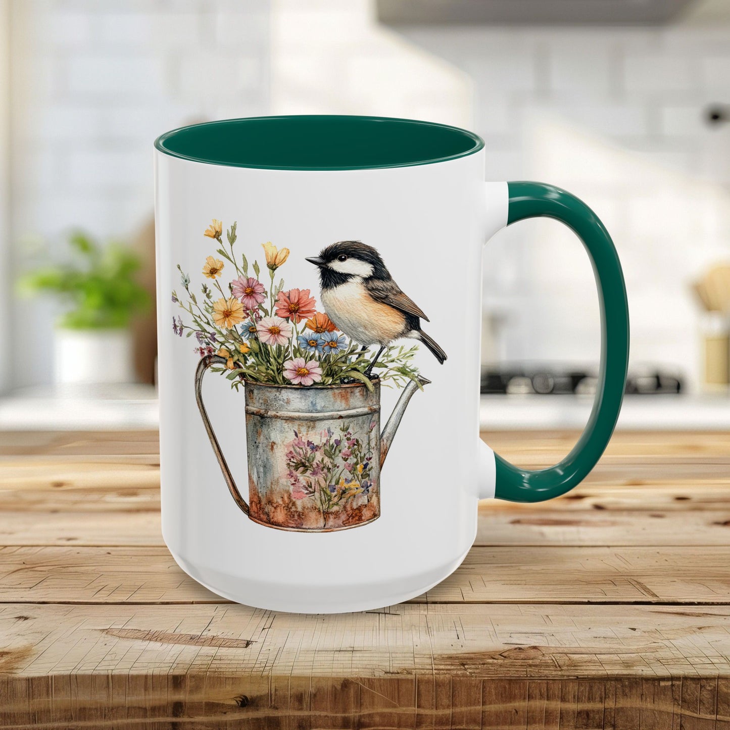 White ceramic 15oz mug with green interior and handle, featuring a watercolor chickadee on a floral watering can.