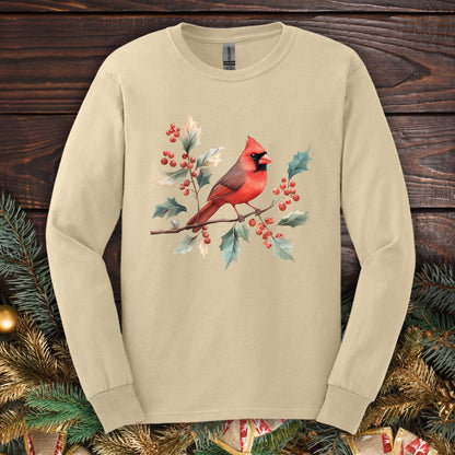 Sand long sleeve tee with a watercolor red cardinal on a holly branch design.