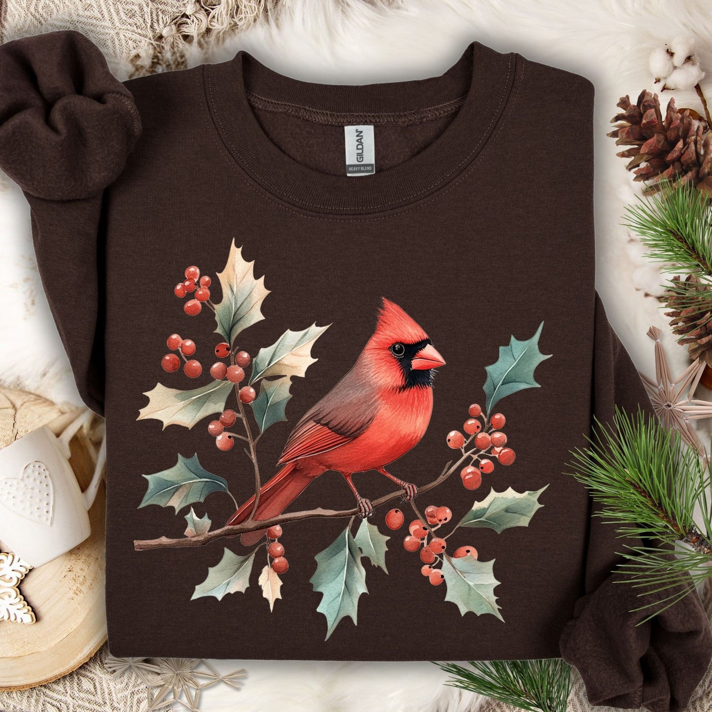 Brown crewneck sweatshirt with a vibrant red cardinal on holly branches design.