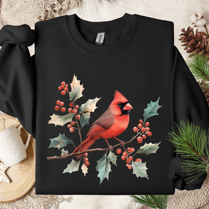 Black crewneck sweatshirt with a vibrant red cardinal on holly branches and berries.