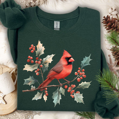 Forest green crewneck sweatshirt with a vibrant red cardinal on holly branches design.
