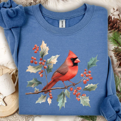 Indigo Blue crewneck sweatshirt with a vibrant red cardinal on holly branches.