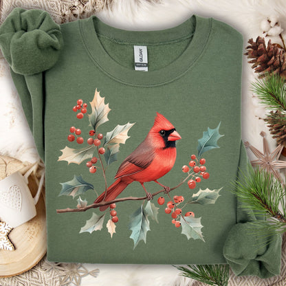 Military Green S sweatshirt with a red cardinal on holly branches design, made from a cotton/polyester blend.