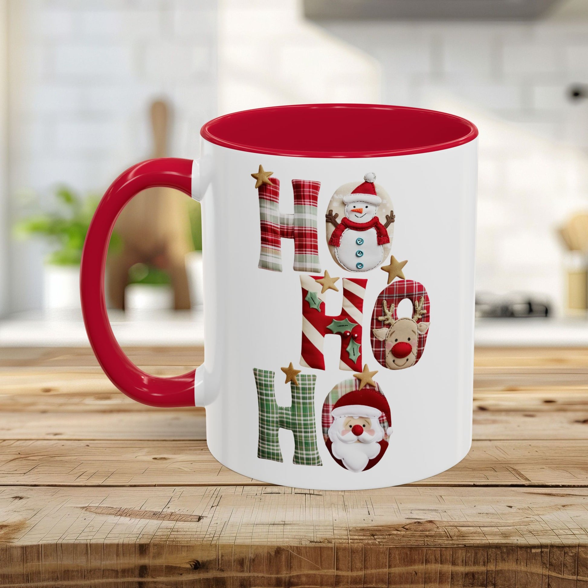 White ceramic Christmas mug with red interior and handle, featuring "Ho Ho Ho" in plaid, candy-cane, and woodland textures with snowmen, Santa, and reindeer.