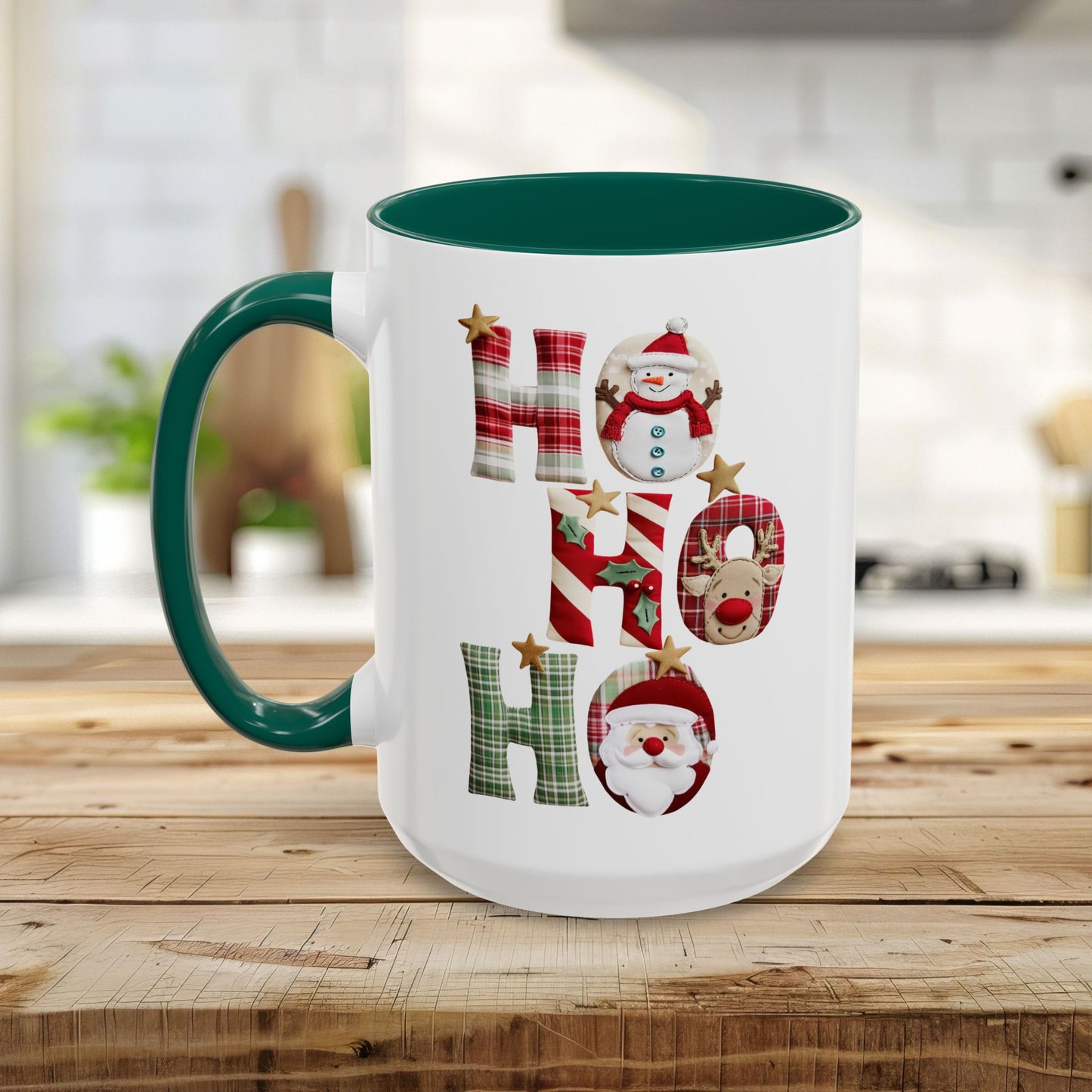 White ceramic Christmas mug with green handle and interior, featuring "Ho Ho Ho" in plaid, candy-cane, and woodland textures with festive characters.