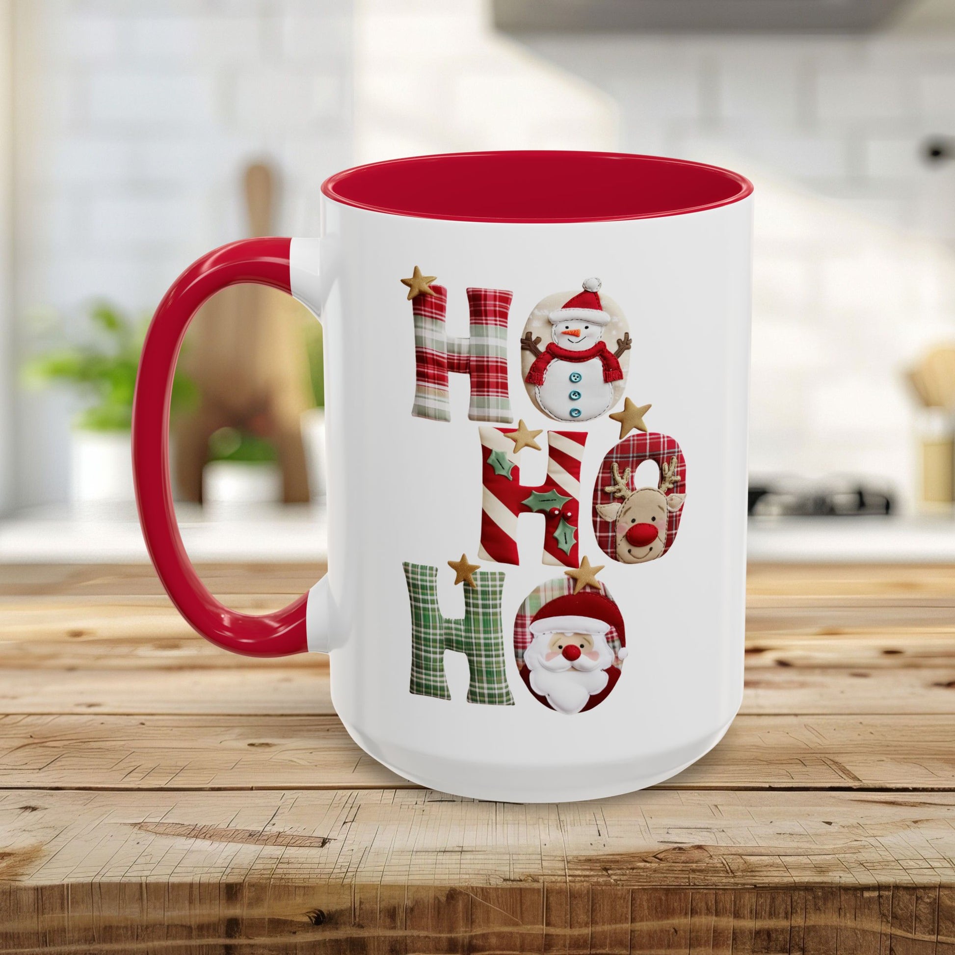 White ceramic mug with red interior and handle, featuring "Ho Ho Ho" in plaid, candy-cane, and woodland textures with snowman, reindeer, and Santa characters.