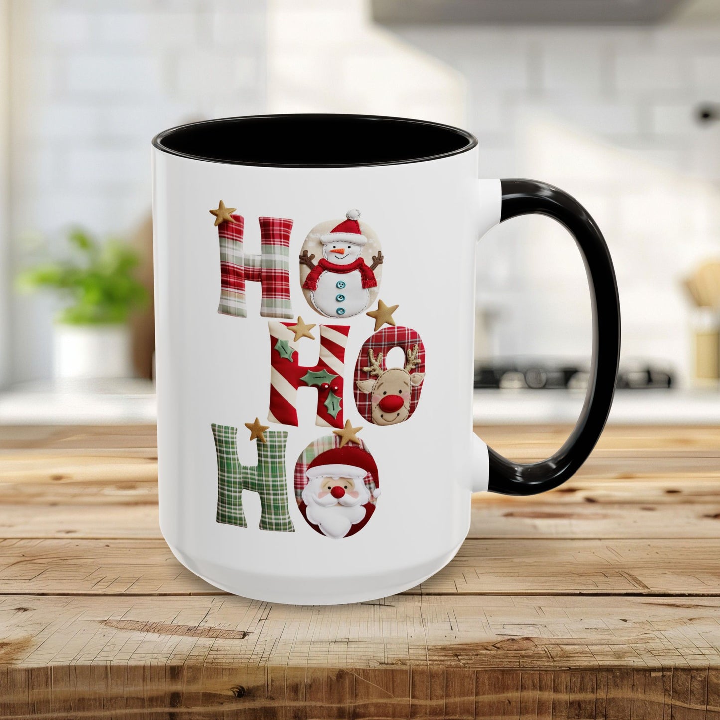 15oz black ceramic mug with "Ho Ho Ho" in plaid, candy cane, and woodland textures featuring Santa, snowman, and reindeer.