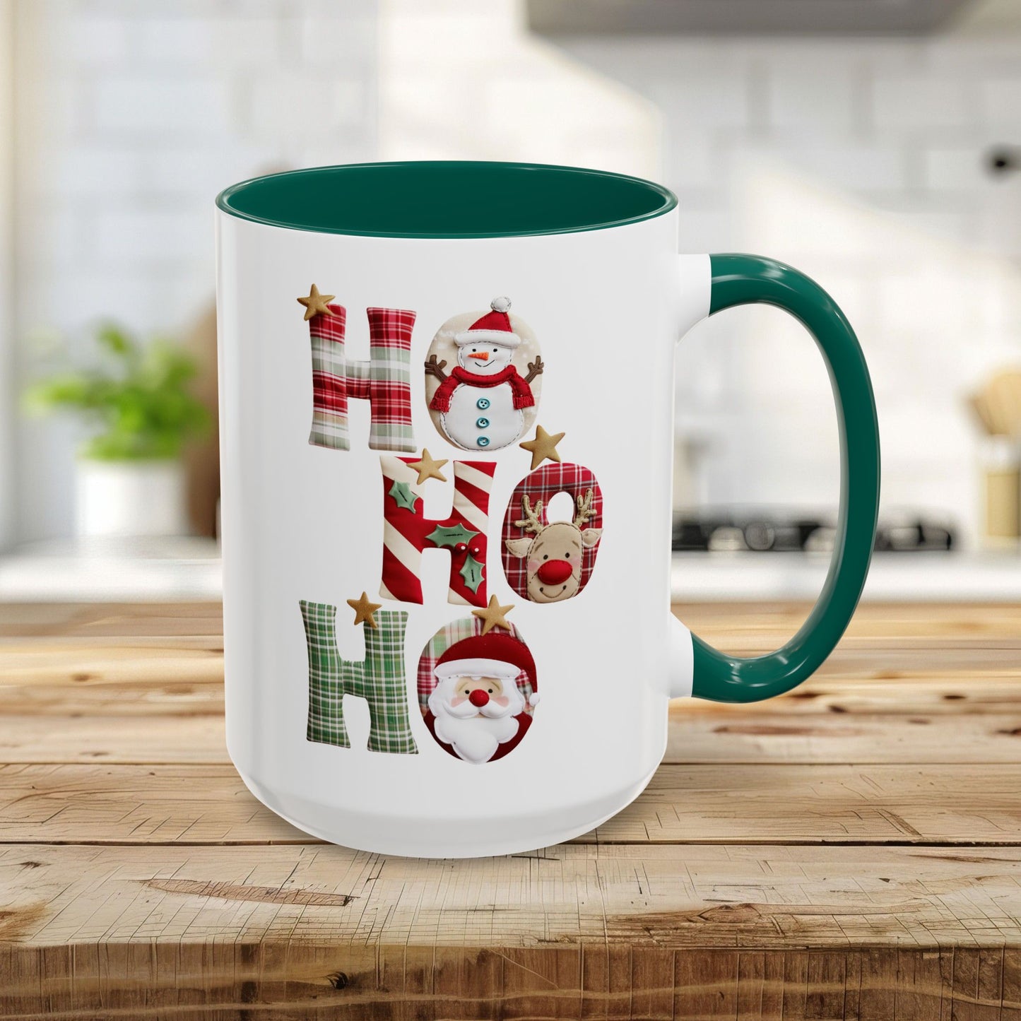 15oz white ceramic mug with green interior and handle, featuring "Ho Ho Ho" in plaid, candy-cane, and woodland textures with tiny seasonal characters.