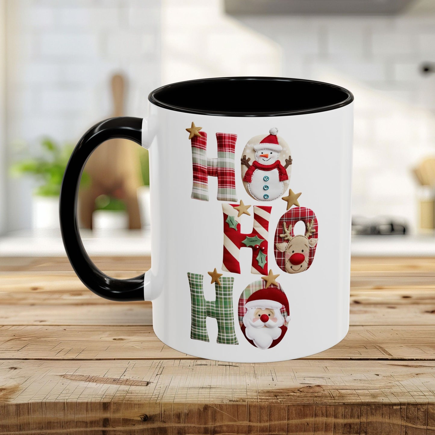 White ceramic mug with black handle and interior, featuring "Ho Ho Ho" in plaid, candy-cane, and woodland textures with festive characters.