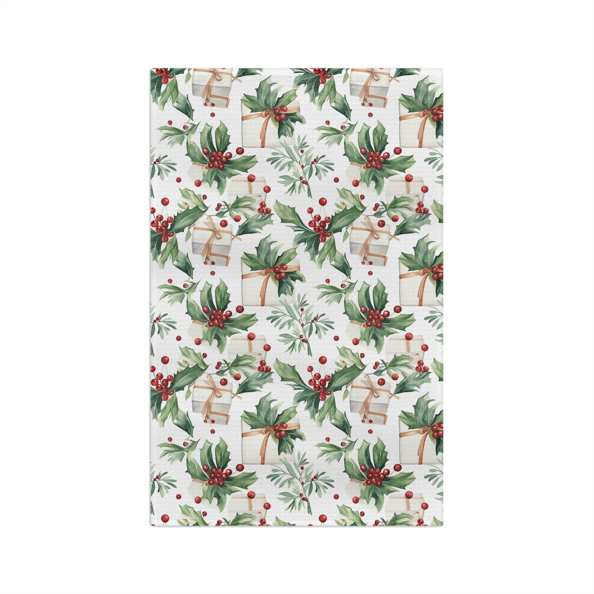 White microfiber tea towel with watercolor holly, red berries, and wrapped gifts.