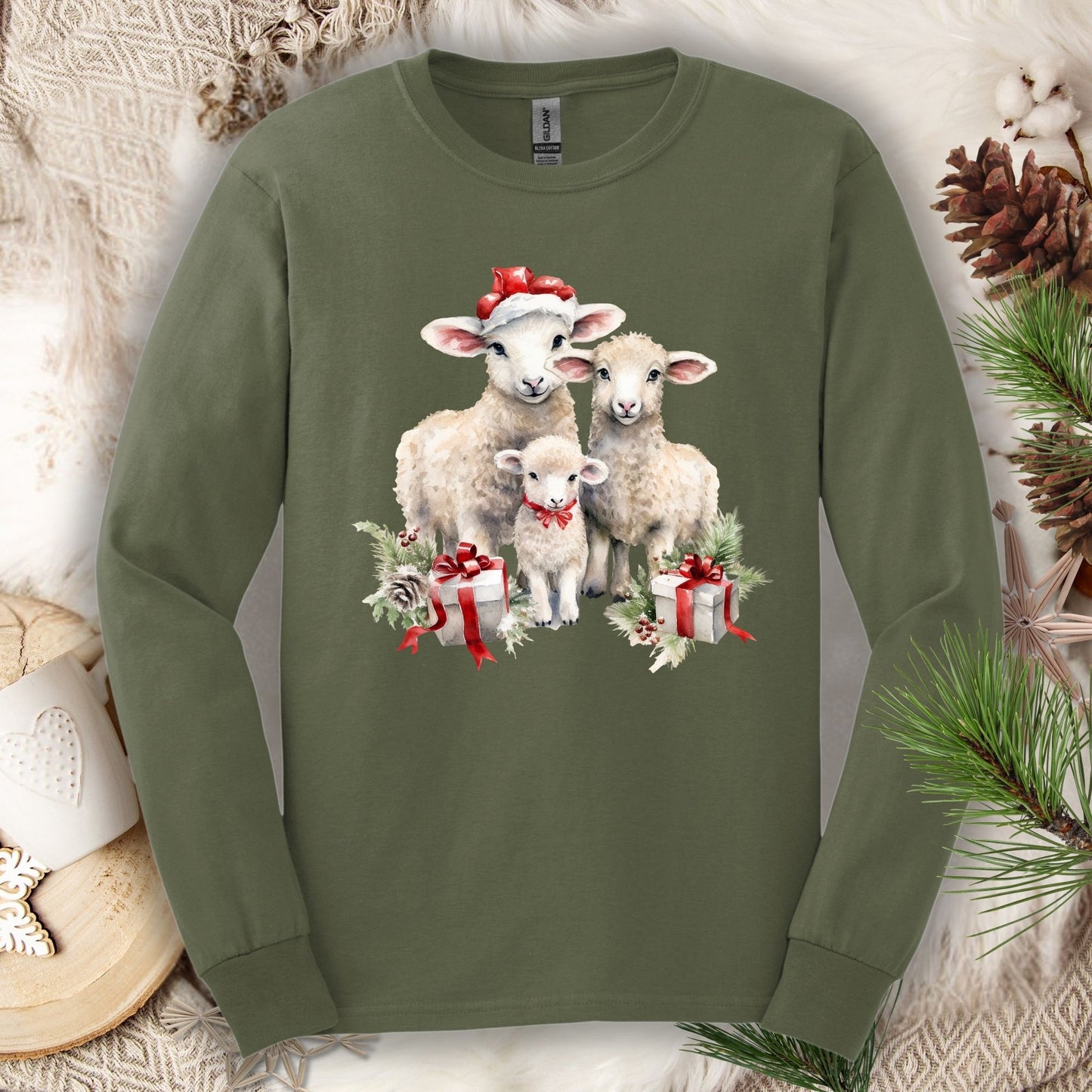 Military Green Gildan long sleeve tee with three watercolor Christmas lambs in Santa hats and gifts.